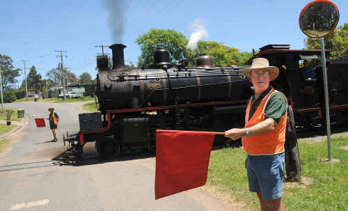 Flagmen Brian Davis and Geoff Johanson will man the level crossing at Dagun Station for the final time on November 21, marking the end of an historic tradition. Flagmen Brian Davis and Geoff Johanson will man the level crossing at Dagun Station for the final time on November 21, marking the end of an historic tradition.